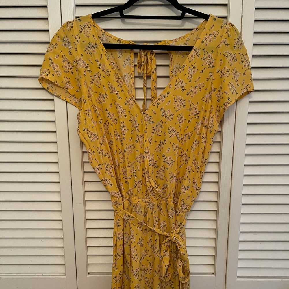 A floral yellow tie short romper